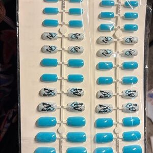 Two (2) Sets of Press on Nails Medium length